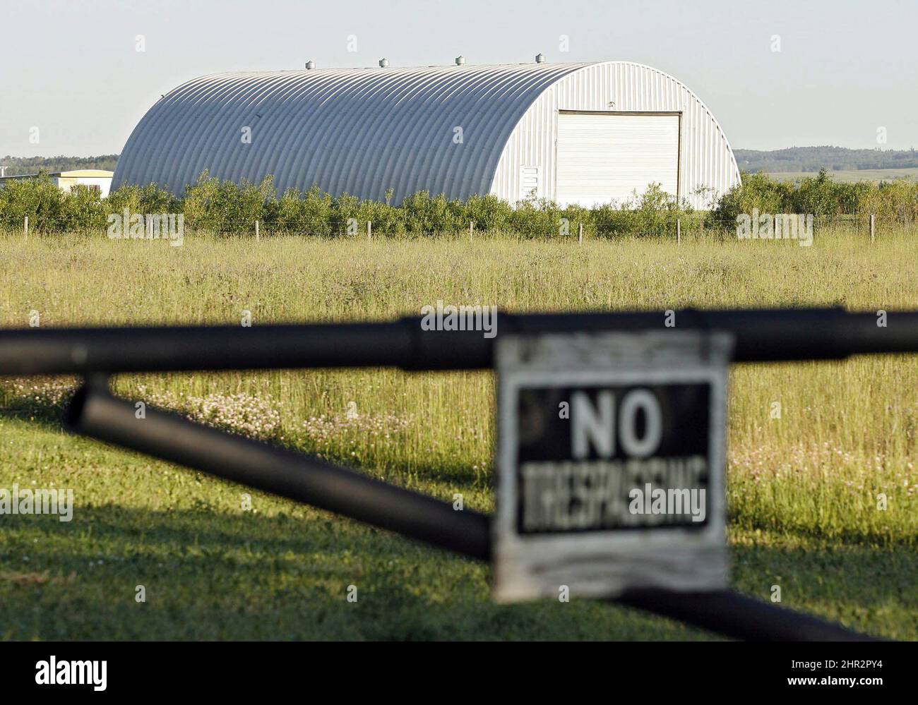 FILE - In this July 12, 2007 file photo, the Roszko farm, which was the scene of the deaths of four Royal Canadian Mounted Police officers on March 3, 2005, is seen near Mayerthorpe, Alberta, Canada. (AP Photo/The Canadian Press, Jeff McIntosh, File) Stock Photo