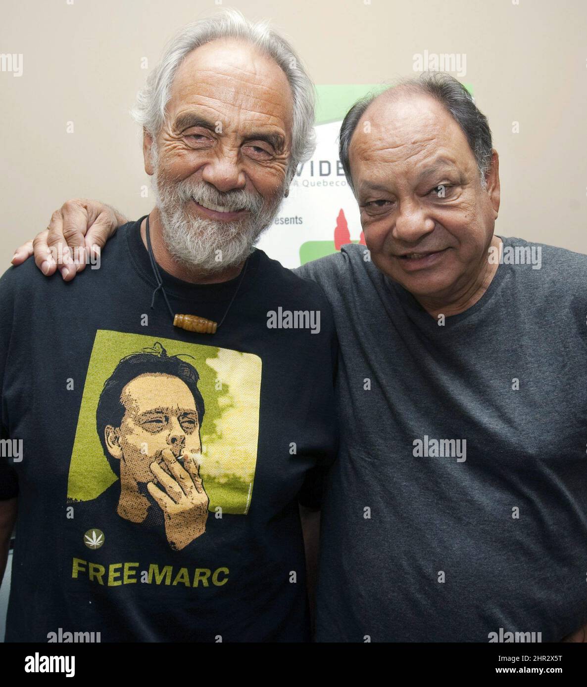 Tommy Chong, left, and Richard 'Cheech' Marin, pose with a Marc Emery shirt on July 15, 2010 in Montreal. Tommy Chong, half of the comedic pothead duo Cheech and Chong, is endorsing a marijuana activist who's running to lead the B.C. New Democrats. Chong has posted a minute-long YouTube video in which he says Dana Larsen can 'change the face of this country.' (AP Photo/The Canadian Press, Ryan Remiorz) Stock Photo