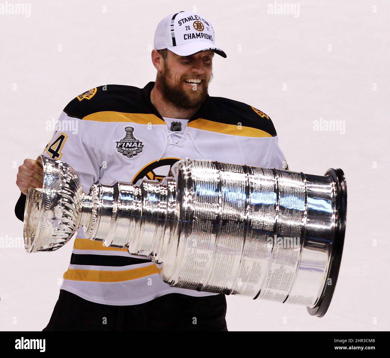 Boston Bruins Dennis Seidenberg hoists 