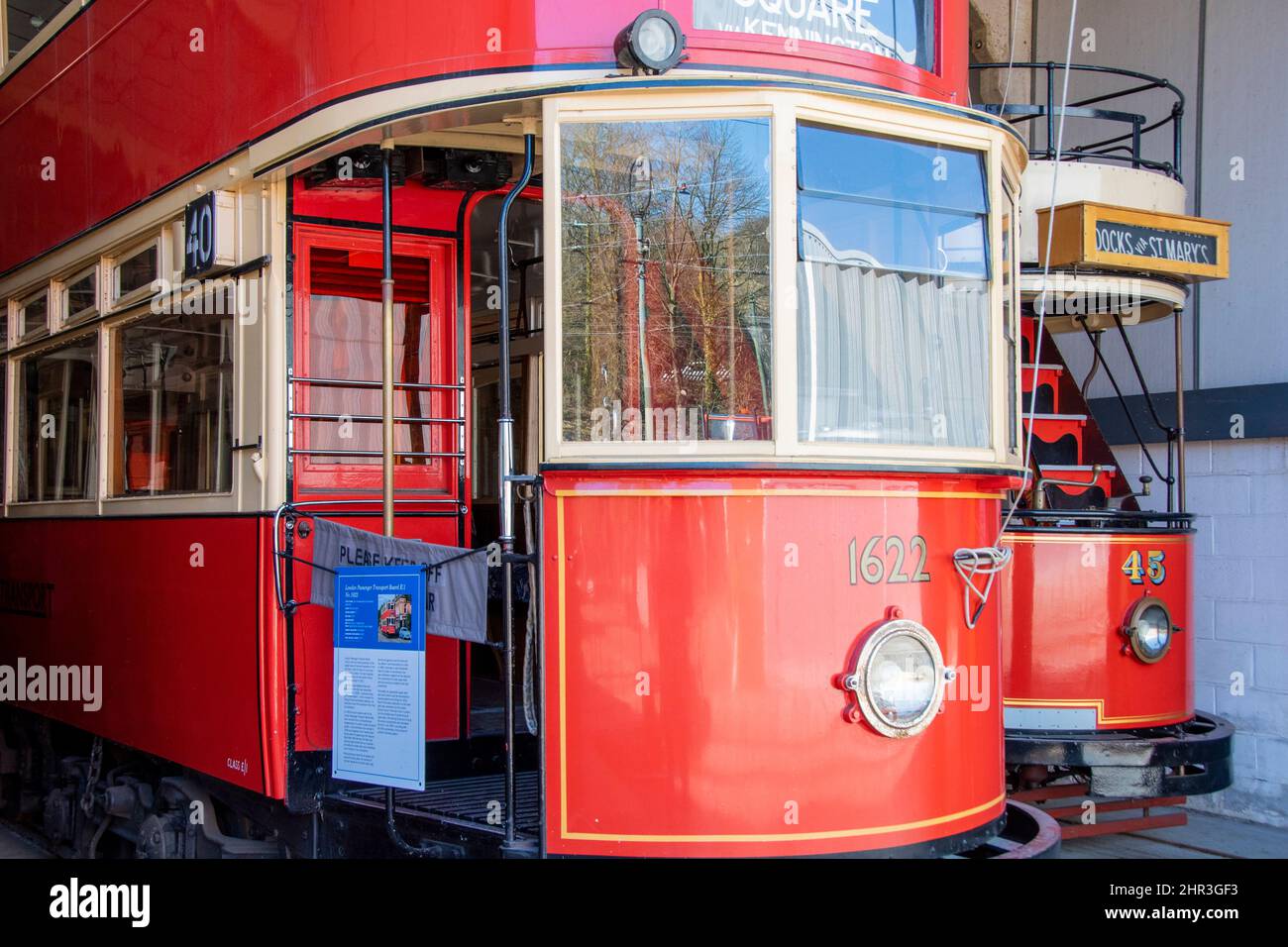 Derbyshire, UK – 5 April 2018: A vintage tram stored in the vehicle garage at Crich Tramway Village, the national tram museum Stock Photo
