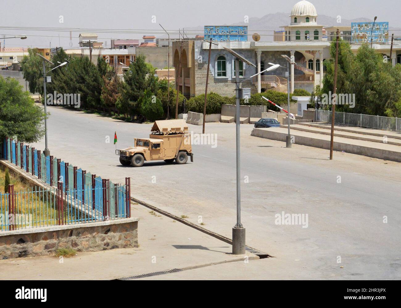 An armoured vehicle belonging to the Afghan National Civil Order Policer sits at Mullah Naquib Square in Kandahar city to deter violence on Wednesday July 13, 2011, for the funeral of Ahmed Wali Karzai, the brother of the Afghan president, who was murdered in his home by a close associate. THE CANADIAN PRESS/ Murray Brewster Stock Photo