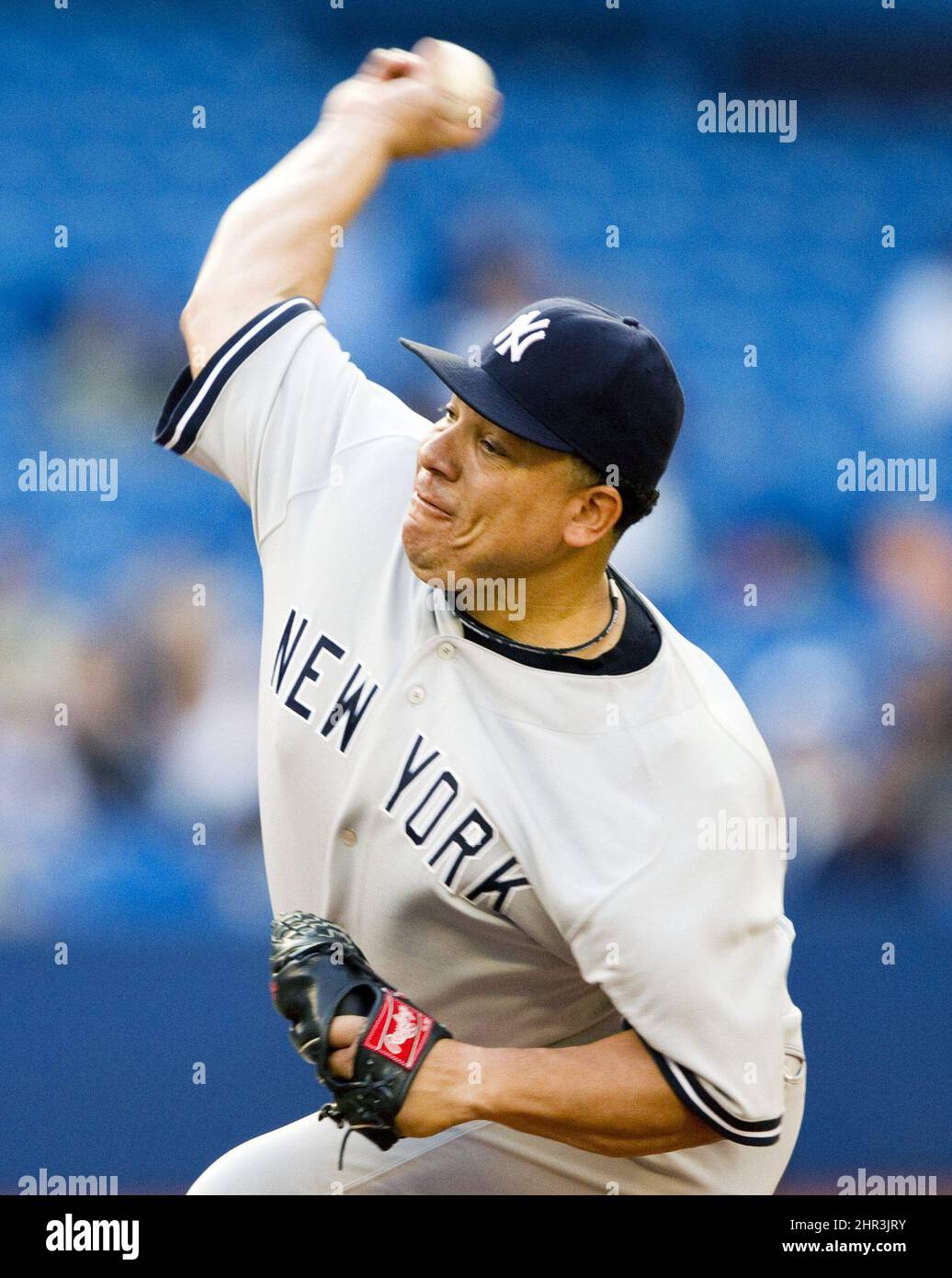 New York Yankees' Bartolo Colon delivers a pitch during the first