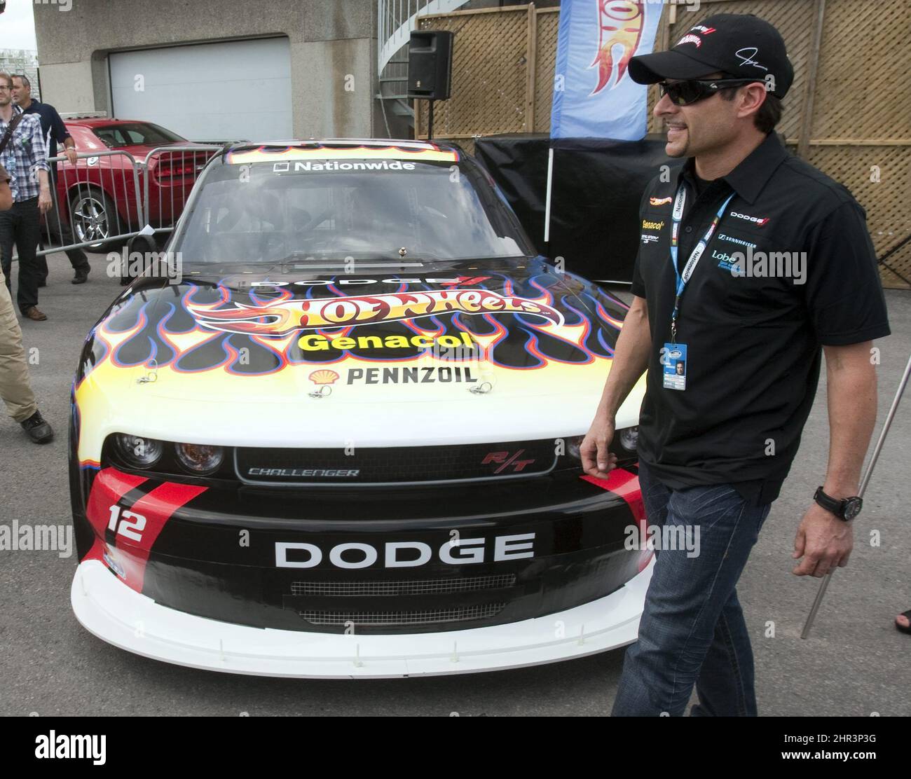 Driver Alex Tagliani checks out his new Penske racing Dodge at the NAPA Auto Parts 200 NASCAR Nationwide race Thursday, August 18, 2011 at the Circuit Gilles Villeneuve in Montreal.THE CANADIAN PRESS/Ryan Remiorz Stock Photo