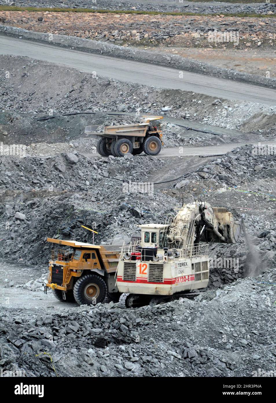 Gold miners work in the open pit mine at Agnico-Eagle's Meadowbank Mine ...