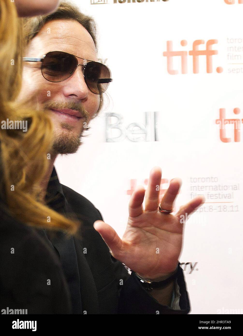 Peal Jam lead singer Eddie Vedder quickly walks the red carpet before