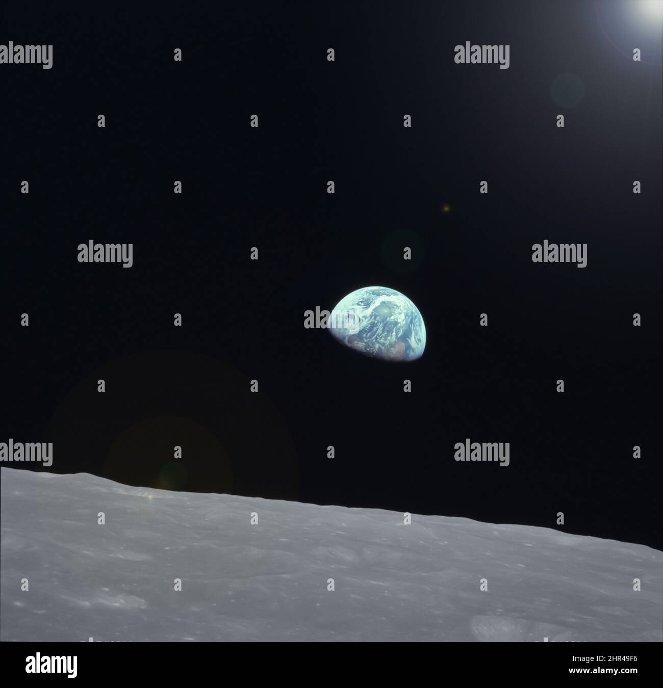 Earth photo taken from moon,world rising from lunar surface on the horizon,blue World image from moon surface.Elements of this image furnished by NASA Stock Photo