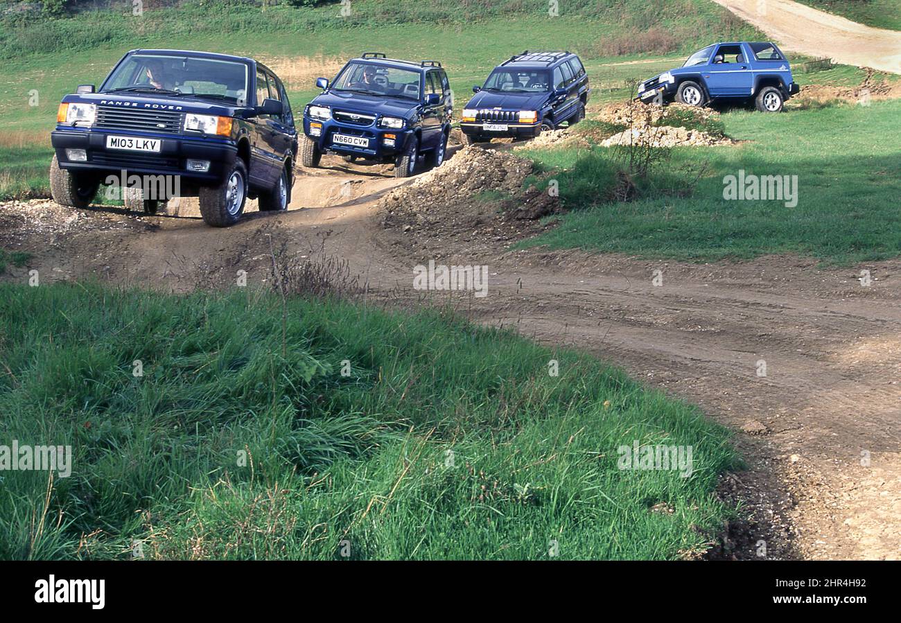 Off Road Testing Four 4x4 SUV vehicles being tested off road Stock Photo - Alamy