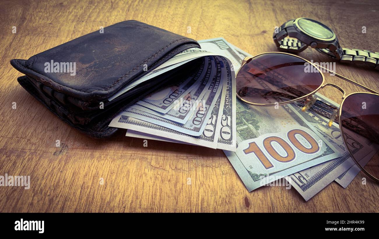 Straight view of an old wallet with bank notes Stock Photo Alamy