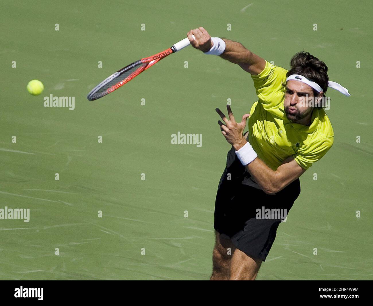 Jeremy Chardy, of France, serves against Donald Young, of the United States, at the Rogers Cup tennis tournament in Toronto, Monday Aug. 6, 2012. (AP Photo/The Canadian Press, Aaron Vincent Elkaim) Stock Photo