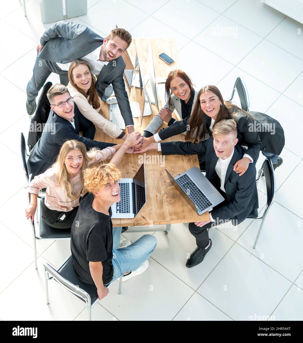 top view. young business team showing their unity Stock Photo - Alamy