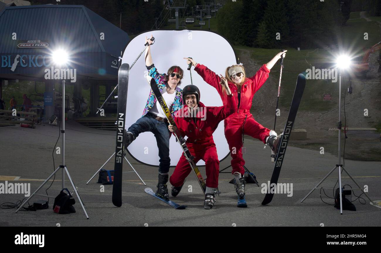 Skiers Rory Cullen of London, England, left to right, Alex Froehlich of Munich, Germany and Sarah Macleod of London, England pose in their costumes at the base of Blackcomb mountain in Whistler, B.C. Monday, May 27, 2013. The unofficial event marking the end of the season is called 'Gaper Day' by the locals. THE CANADIAN PRESS/Jonathan Hayward Stock Photo