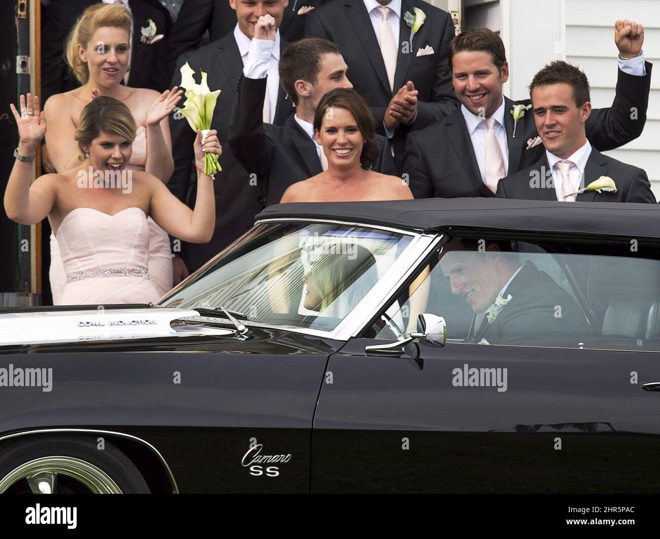 Toronto Maple Leafs captain Dion Phaneuf, right, waves as he arrives at his  wedding to actress Elisha Cuthbert at St. James Catholic Church in  Summerfield, P.E.I. on Saturday, July 6, 2013. THE