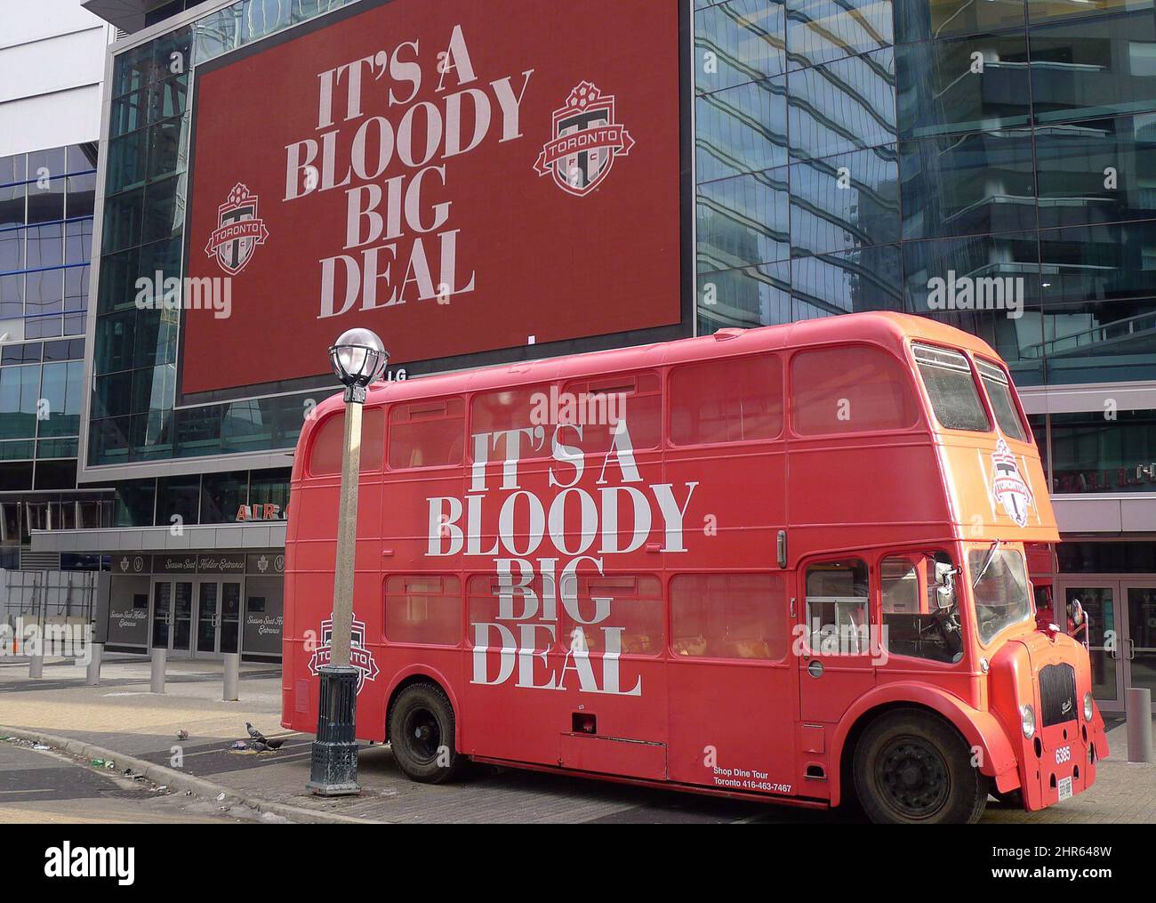 A double-decker bus is parked outside the the Air Canada Centre in Toronto, Jan.13, 2014, where Toronto FC unveiled new players England striker Jermain Defoe and U.S. international midfielder Michael Bradley at a news conference. THE CANADIAN PRESS/Neil Davidson Stock Photo