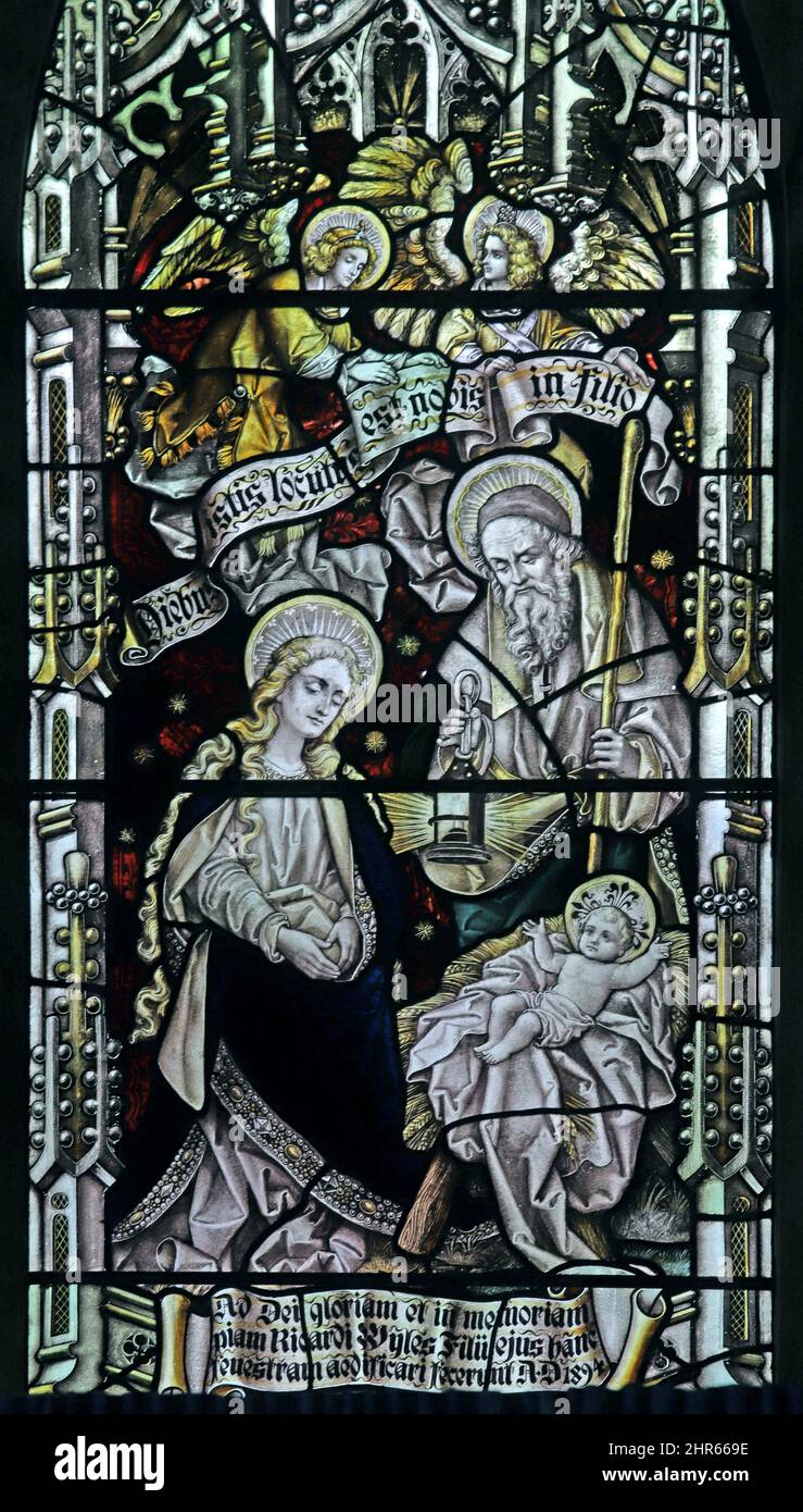 Stained glass window by Percy Bacon & Brothers depicting The nativity, designed by Ernest Geldart, St Mary's Church, Coddenham, Norfolk Stock Photo