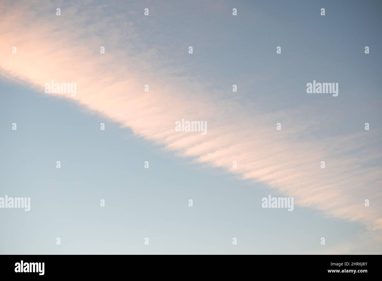 Traces of planes in the sky, exhaust fumes in nice lines on a blue