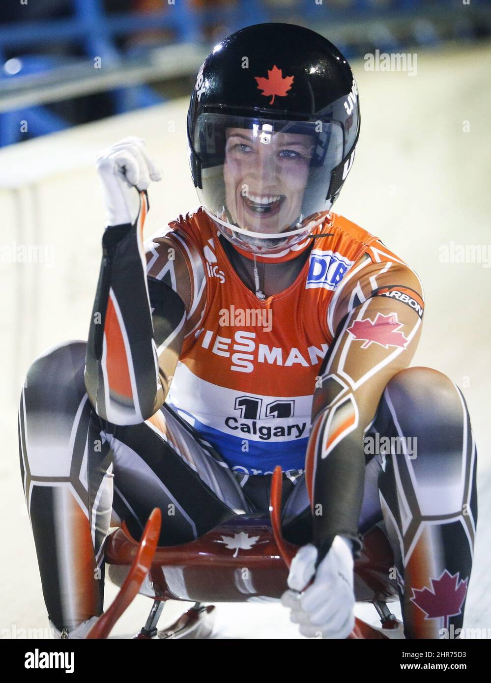 Canada's Arianne Jones, celebrates her third place finish at the women's World Cup luge event in Calgary, Friday, Dec. 12, 2014.THE CANADIAN PRESS/Jeff McIntosh Stock Photo