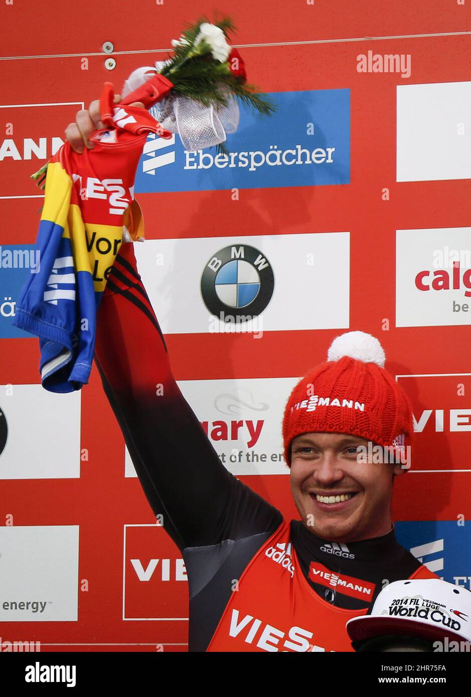 Germany's Felix Loch celebrates his second place finish at the men's World Cup luge event in Calgary Saturday, Dec. 13, 2014. THE CANADIAN PRESS/Jeff McIntosh Stock Photo