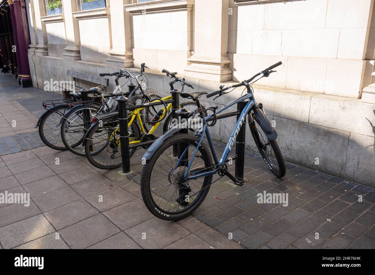 Cycle racks in norwich City centre with cycles locked to the posts