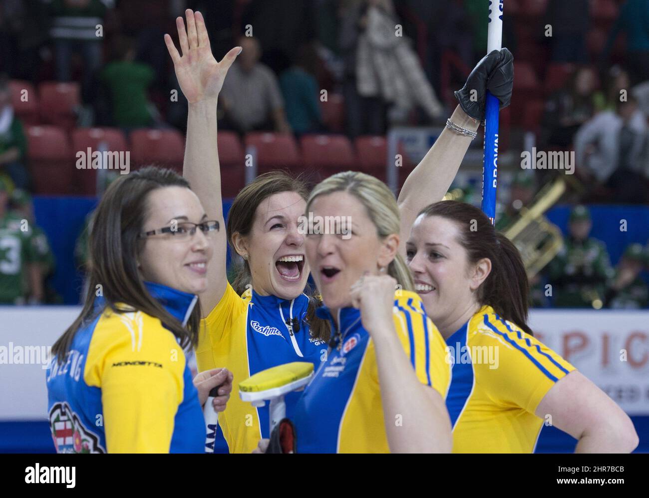 Team Alberta celebrates their win over Saskatchewan following semi