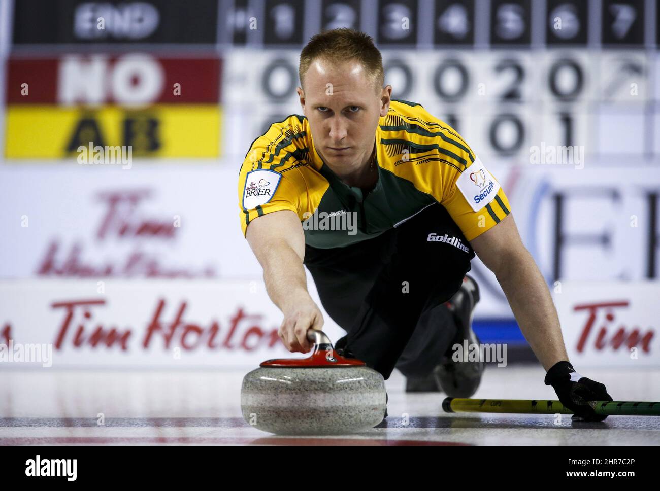 Northern Ontario skip Brad Jacobs delivers a rock during curling action at the Brier in Calgary