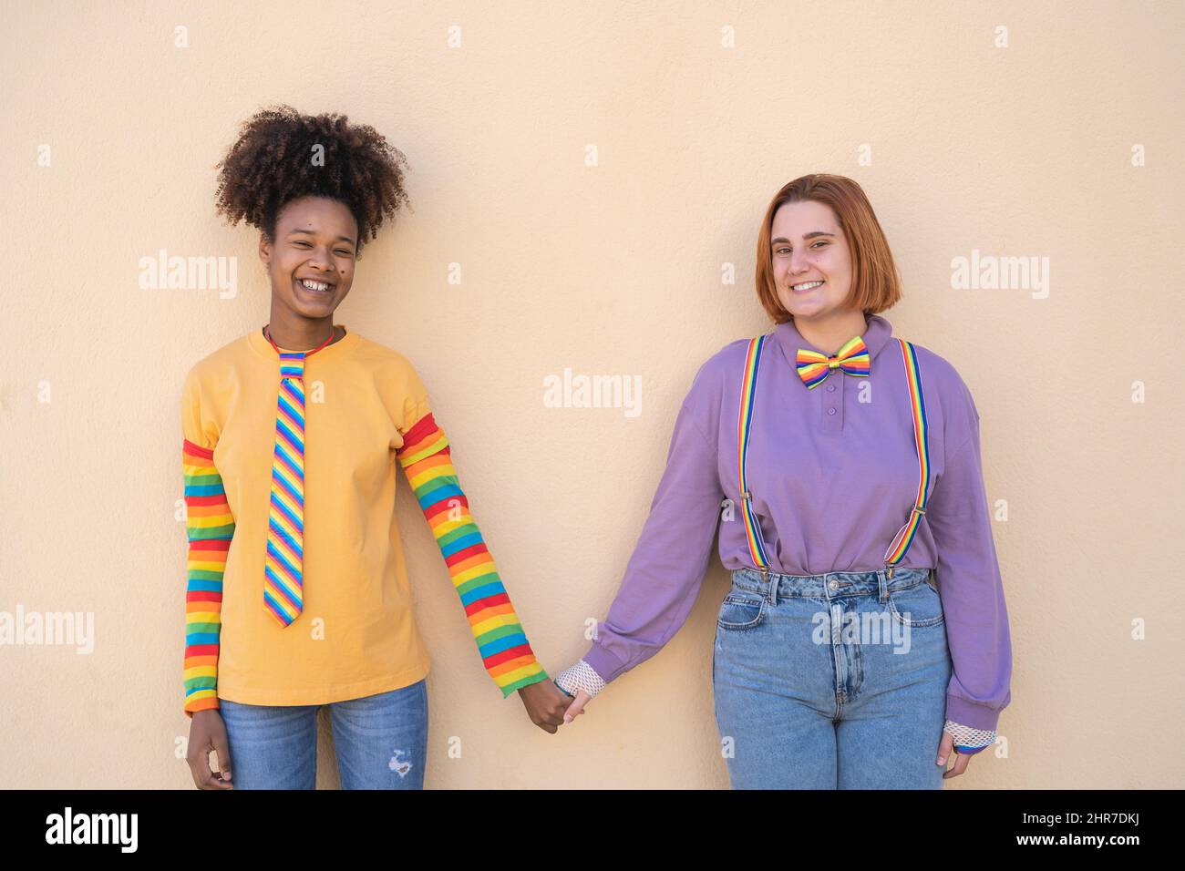 Happy women gay couple holding hands outdoor - Lgbt and love concept Stock Photo