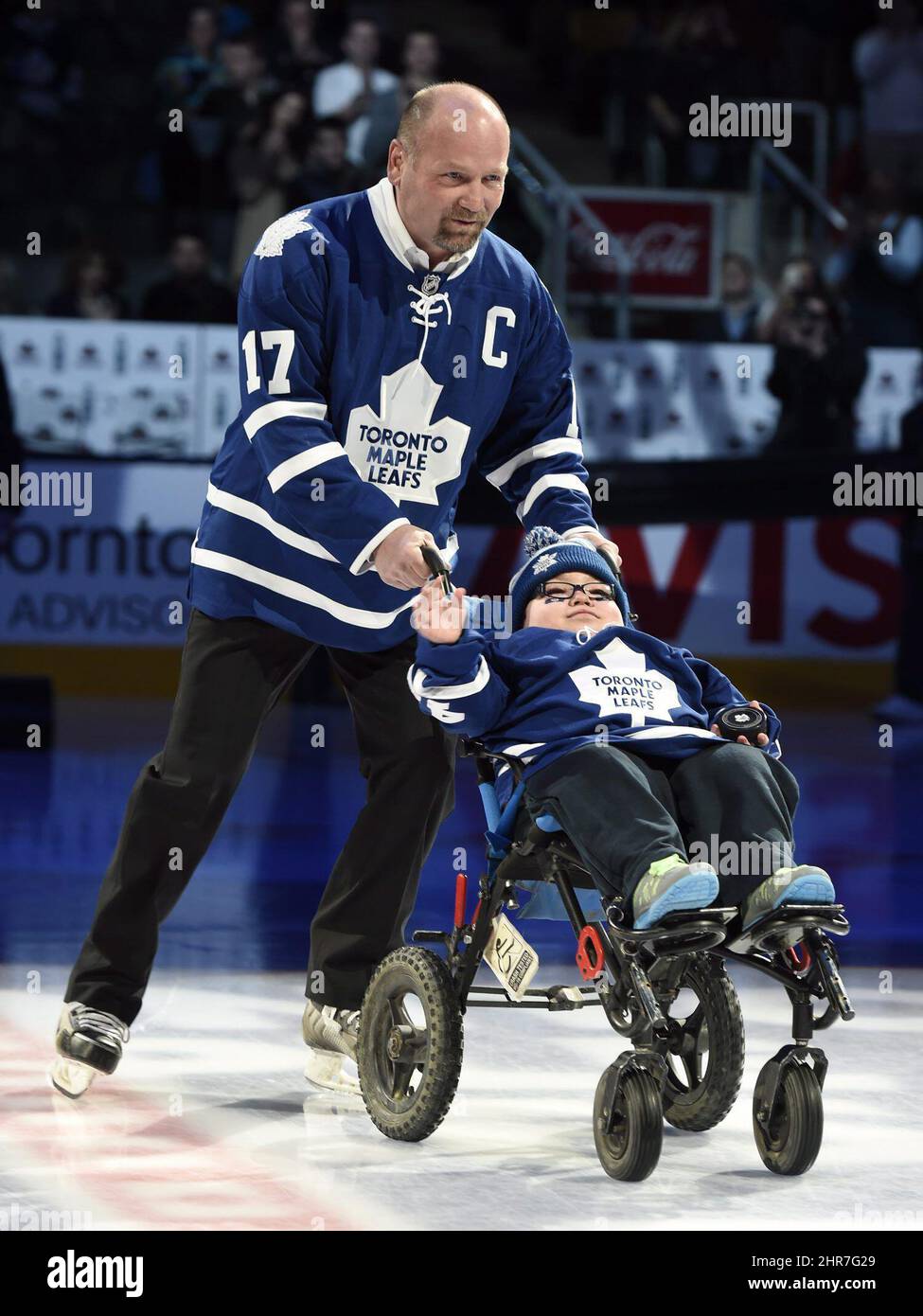 Former Toronto Maple Leaf Mats Sundin and his wife, Josephine Johansson,  watch as his No. 13 is raised to the rafters prior to an NHL hockey game  between the Maple Leafs and