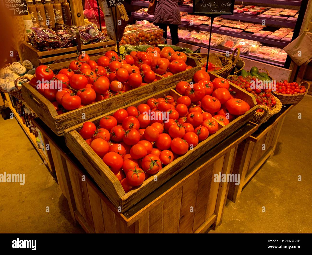 Tomatoes in Farndon Fields farm shop Market Harborough Leicestershire England red bright fresh tasty picked today fresh basket baskets Stock Photo