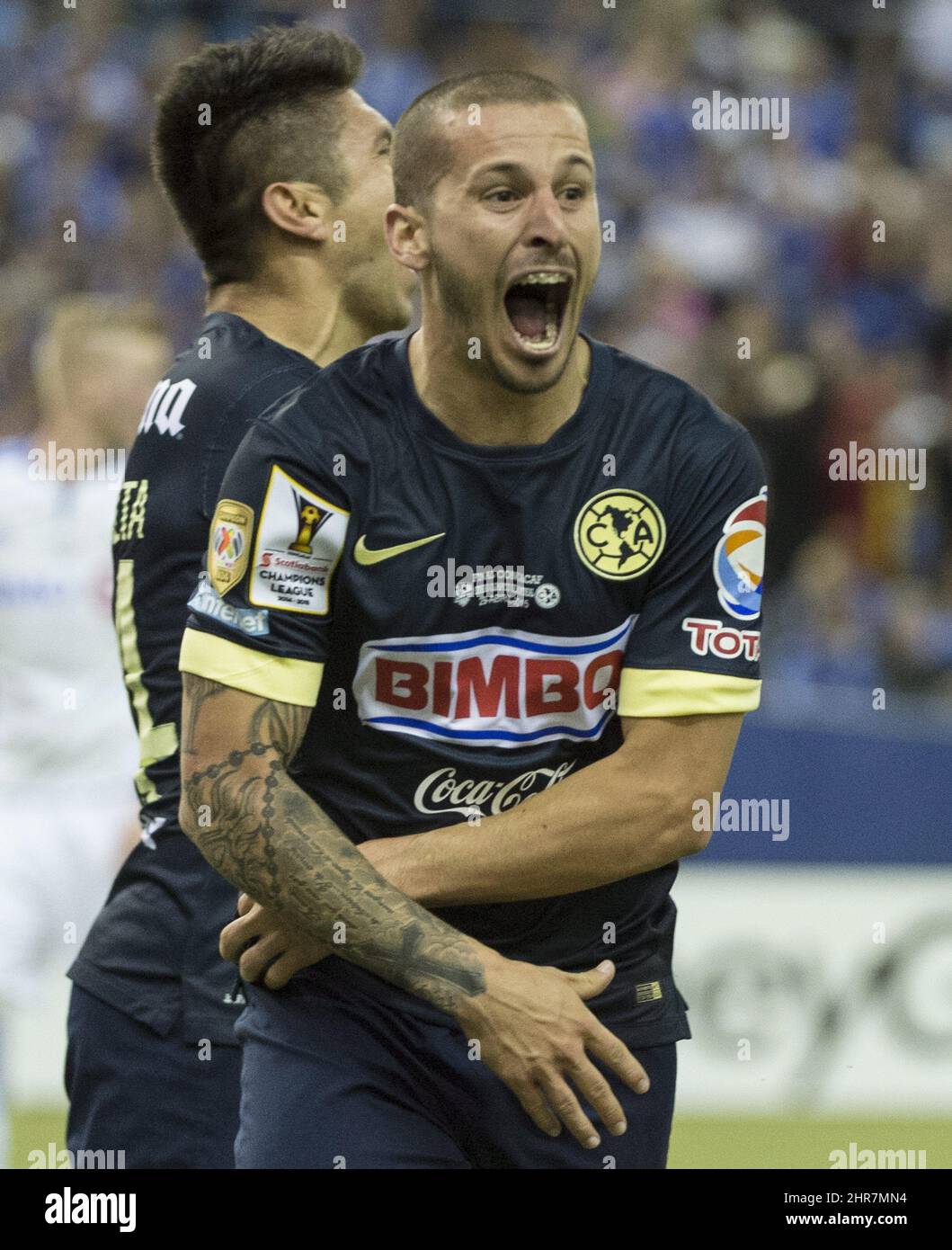 America forward Dario Benedetto removes his jersey as he celebrates his  second goal against the Montreal Impact during second half CONCACAF final  action Wednesday, April 29, 2015 in Montreal. The Club America