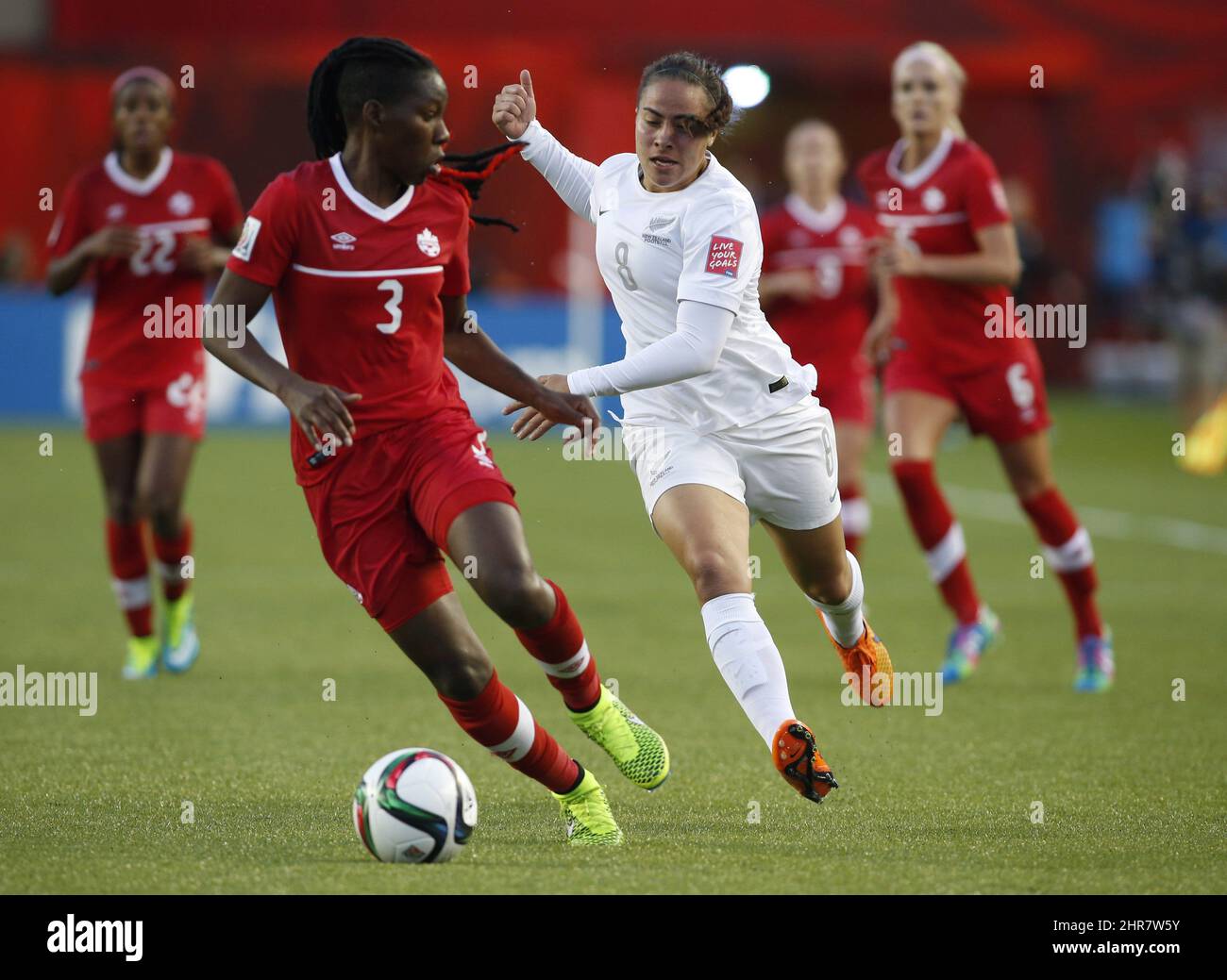 Canada's Kadeisha Buchanan looks back as New Zealand's Jasmine Pereira