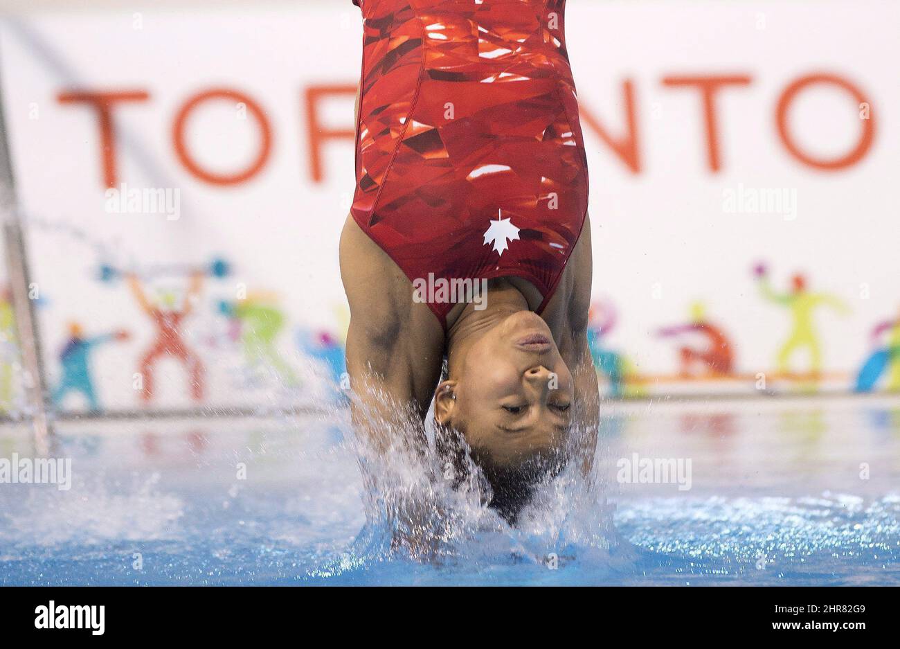 Jennifer Abel of Canada hits the water on a dive on her way to winning ...