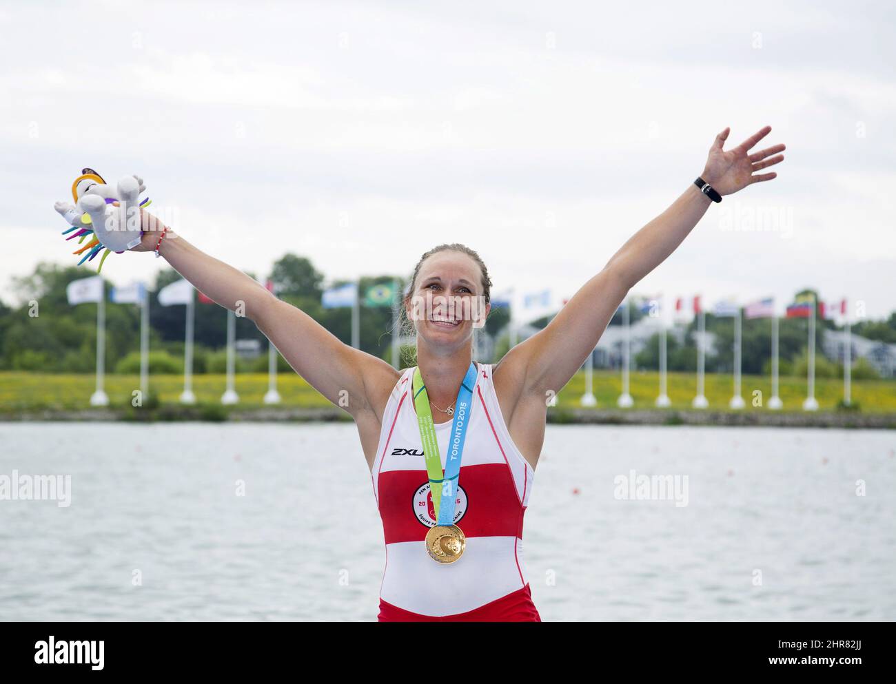 Canada's Carling Zeeman celebrates with her gold medal in the women's single sculls at the 2015 Pan Am Games at the Royal Canadian Henley Rowing Course in St. Catharines, Ont. on Tuesday, July 14, 2015. THE CANADIAN PRESS/Peter Power Stock Photo