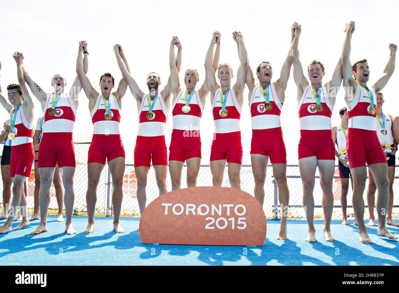Canada's men's eight rowing team celebrates their gold medal victory at the 2015 Pan Am Games on the Royal Canadian Henley Rowing Course in St. Catharines, Ont., Wednesday, July 15, 2015. THE CANADIAN PRESS/Aaron Lynett Stock Photo