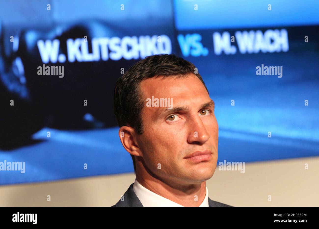 WBO, WBA and IBF world heavyweight boxing champion Wladimir Klitschko from the Ukraine takes part in a press conference in O2 World in Hamburg, Germany, 28 August 2012. Klitschko will try and defend his title against Wach on 10 November 2012. Photo: CHRISTIAN CHARISIUS Stock Photo