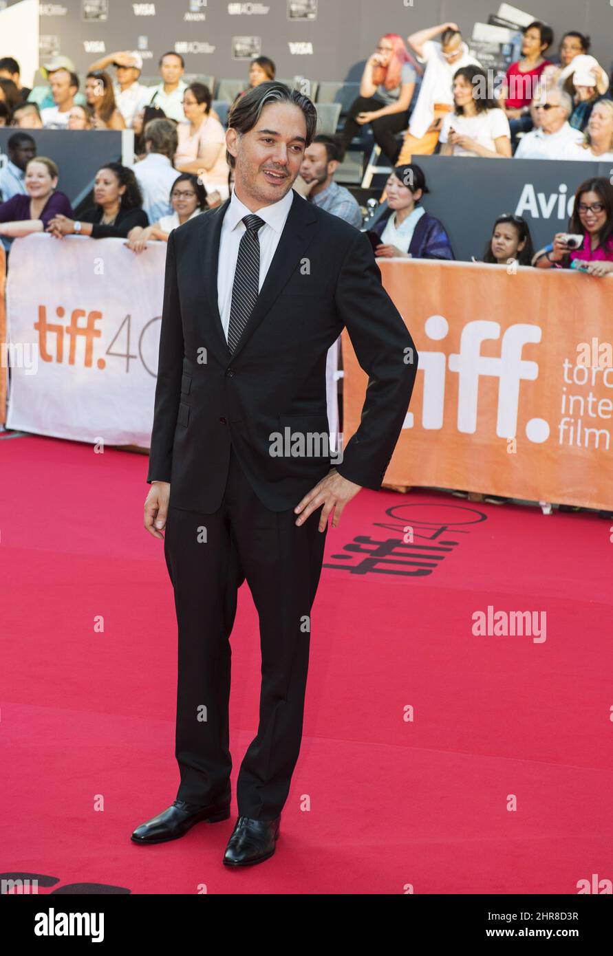 Director Matthew Brown poses for photos on the red carpet at the gala for the film "The Man Who Knew Infinity,"' at the 2015 Toronto International Film Festival on Thursday, Sept. 17, 2015. THE CANADIAN PRESS/Frank Gunn Stock Photo