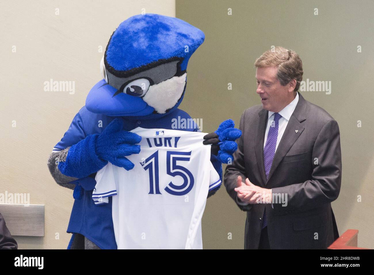 CORRECTS DAY OF THE WEEK Toronto Mayor John Tory is presented with a  replica shirt by Toronto Blue Jays mascot Ace makes a guest appearance to  mark the baseball team's MLB play