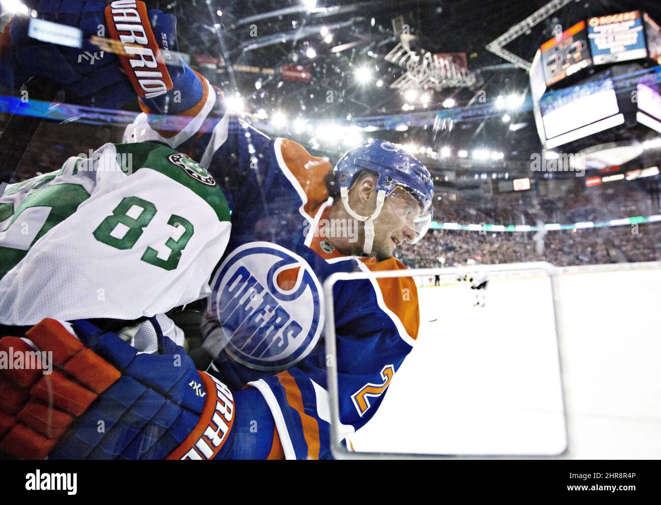 Dallas Stars' Ales Hemsky (83) and Edmonton Oilers' Andrej Sekera (2)  battle in the corner during first period NHL action in Edmonton, Alta., on  Friday December 4, 2015. THE CANADIAN PRESS/Jason Franson