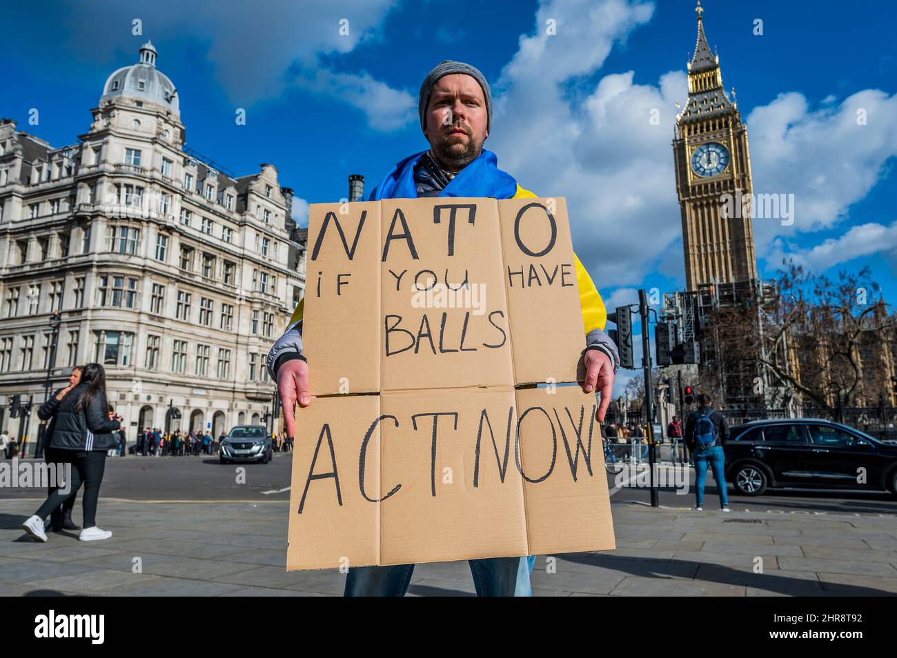 London, UK. 25th Feb, 2022. NATO act now - Ukranians and Russians gather Westminster to demand that Putin Stops The War and invasion of Ukraine. Credit: Guy Bell/Alamy Live News Stock Photo