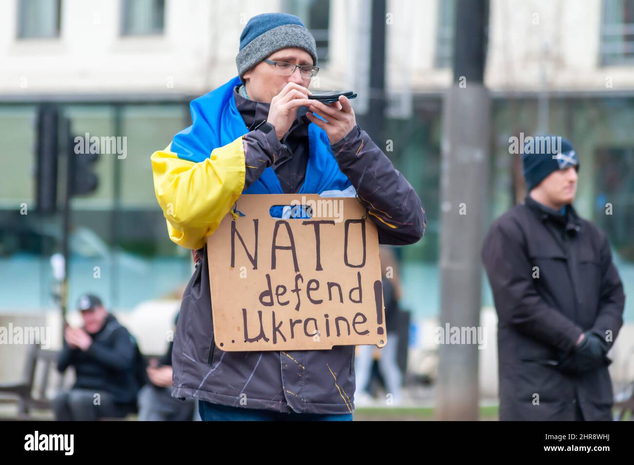 Glasgow, Scotland, UK. 25th February, 2022. A sign saying Nato Defend Ukraine is shown in