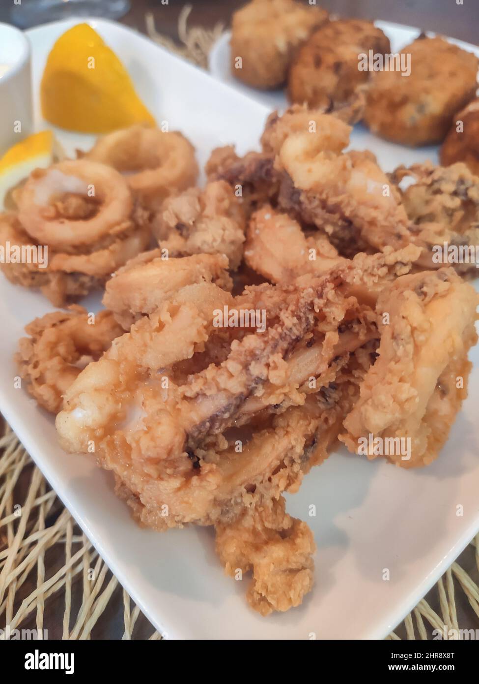 Delicious marinated fried squid fish , typical andalusian food.Spanish