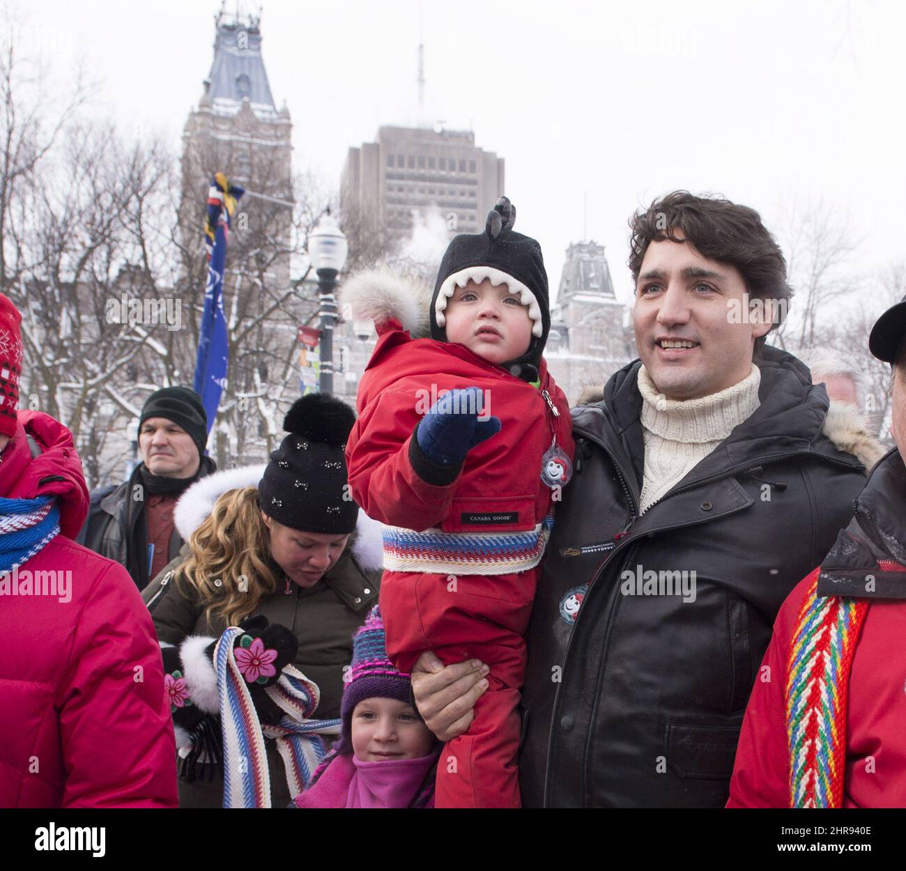 Prime Minister Justin Trudeau, right, holds his son Hadrian as he and