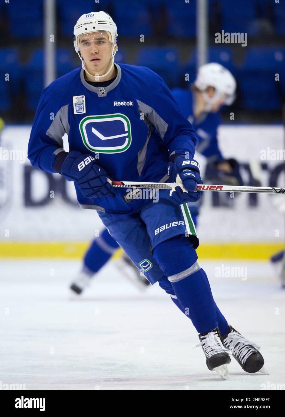 Vancouver Canucks' defenceman Nikita Tryamkin, of Russia, skates during NHL  hockey practice in Vancouver, B.C., on Friday March 11, 2016. Tryamkin  signed a contract with the Canucks earlier this week after playing