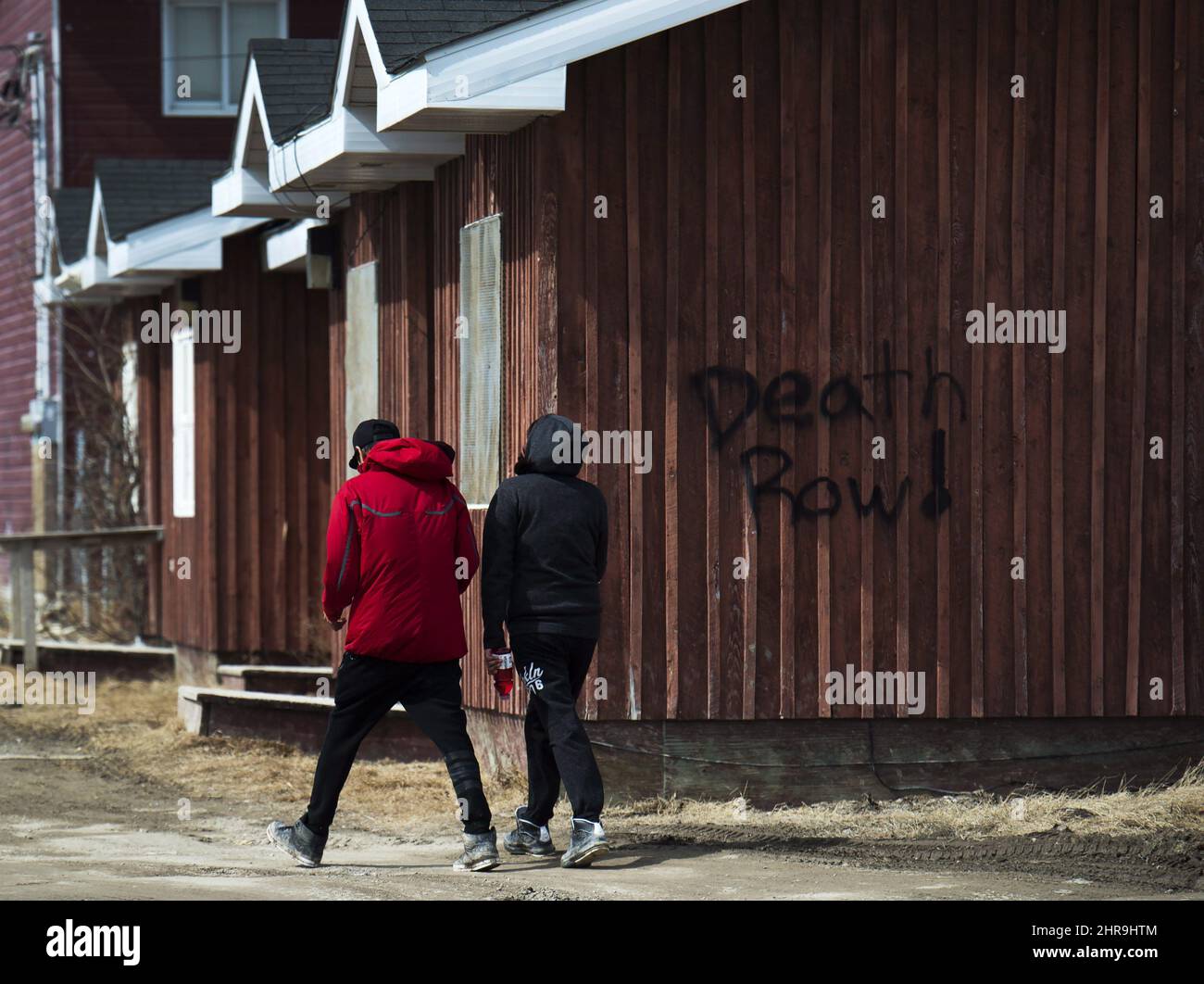 Indigenous people walk through the streets in the northern Ontario