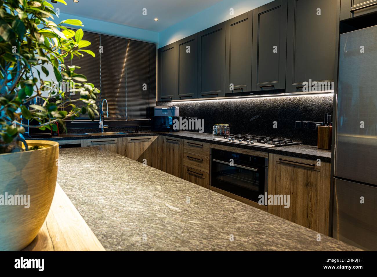 Beautiful kitchen interior design with a wooden cupboard and modern ...