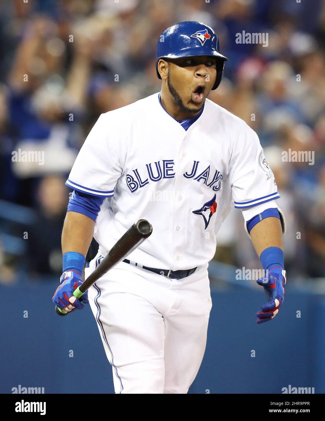 Toronto Blue Jays' Edwin Encarnacion reacts after hitting walk off