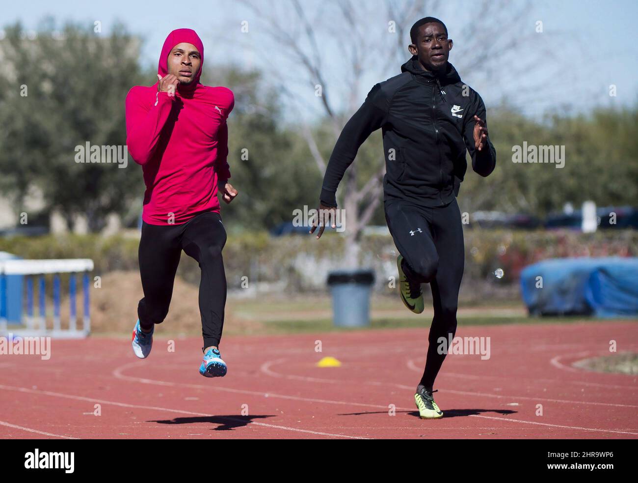 Canadian Track athlete Andre De Grasse, left, and Hua Wilfried, of the