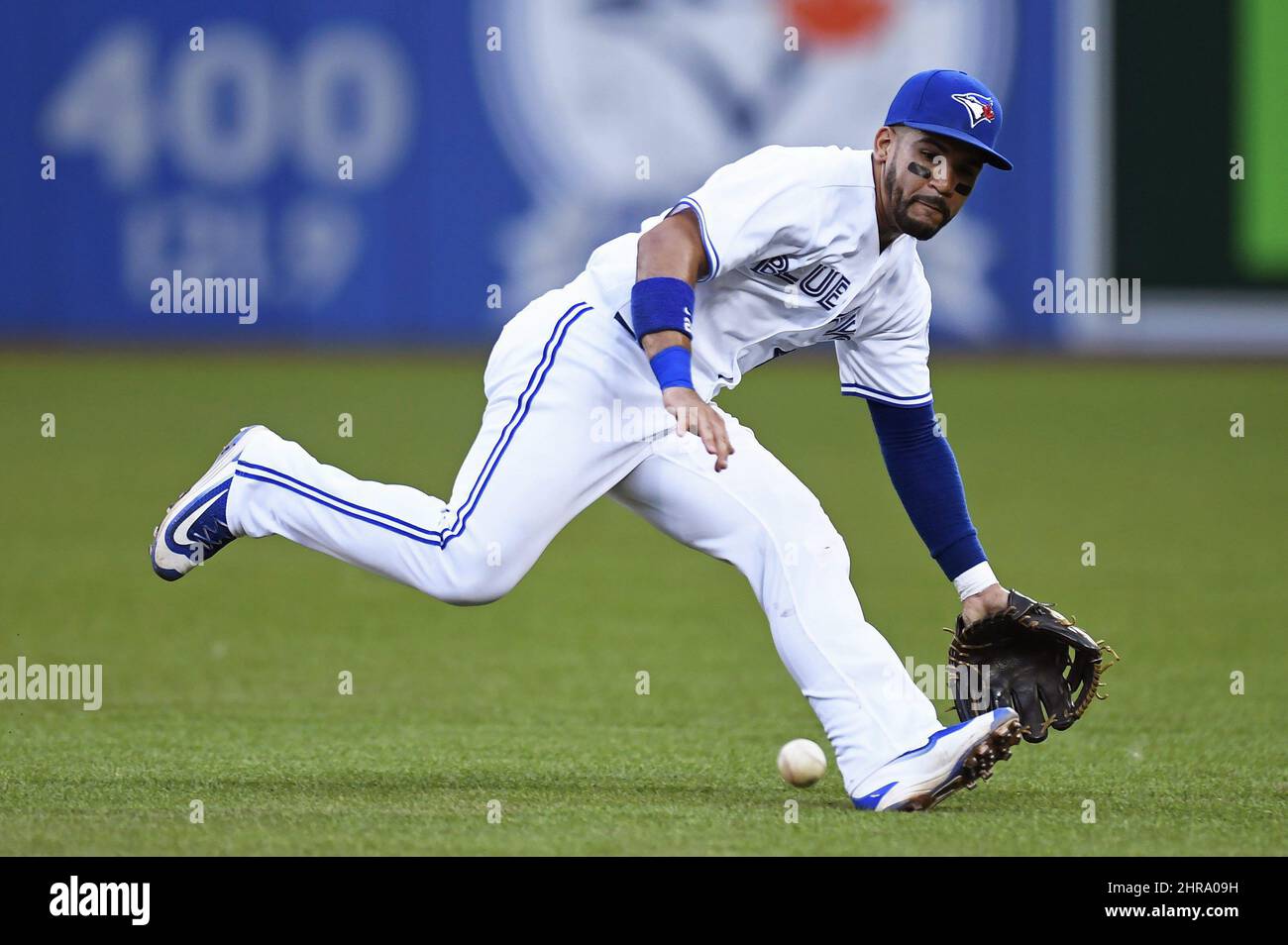 Toronto Blue Jays' Devon Travis fields a ball against the San Diego Padres during fourth inning MLB interleague baseball action, in Toronto on Tuesday, July 26, 2016. THE CANADIAN PRESS/Frank Gunn Stock Photo