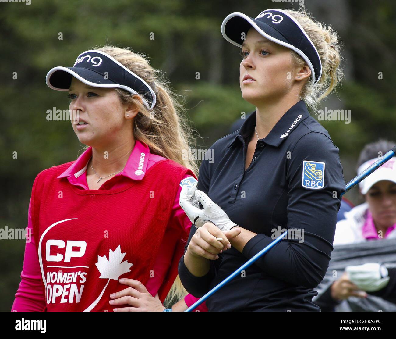Canada's Brooke Henderson, right, with her caddie sister Brittany Henderson during the first