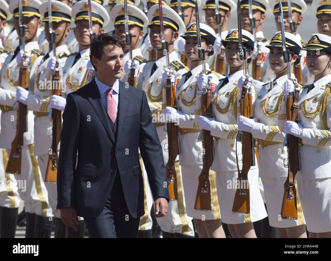 Canadian Prime Minister Justin Trudeau observes troops of the People's ...