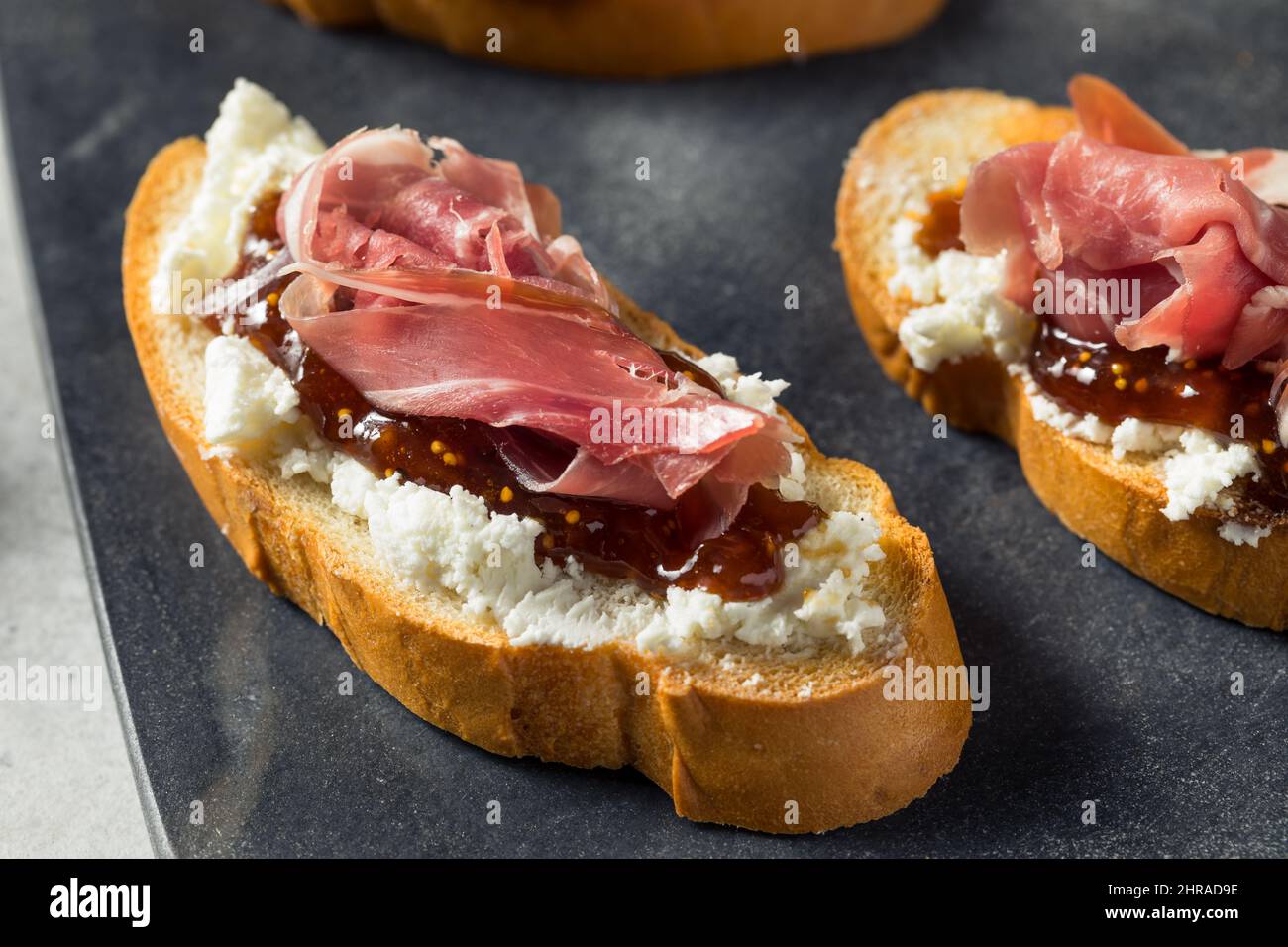 Homemade Prosciutto Goat Cheese Toast with Fig Jam Stock Photo Alamy