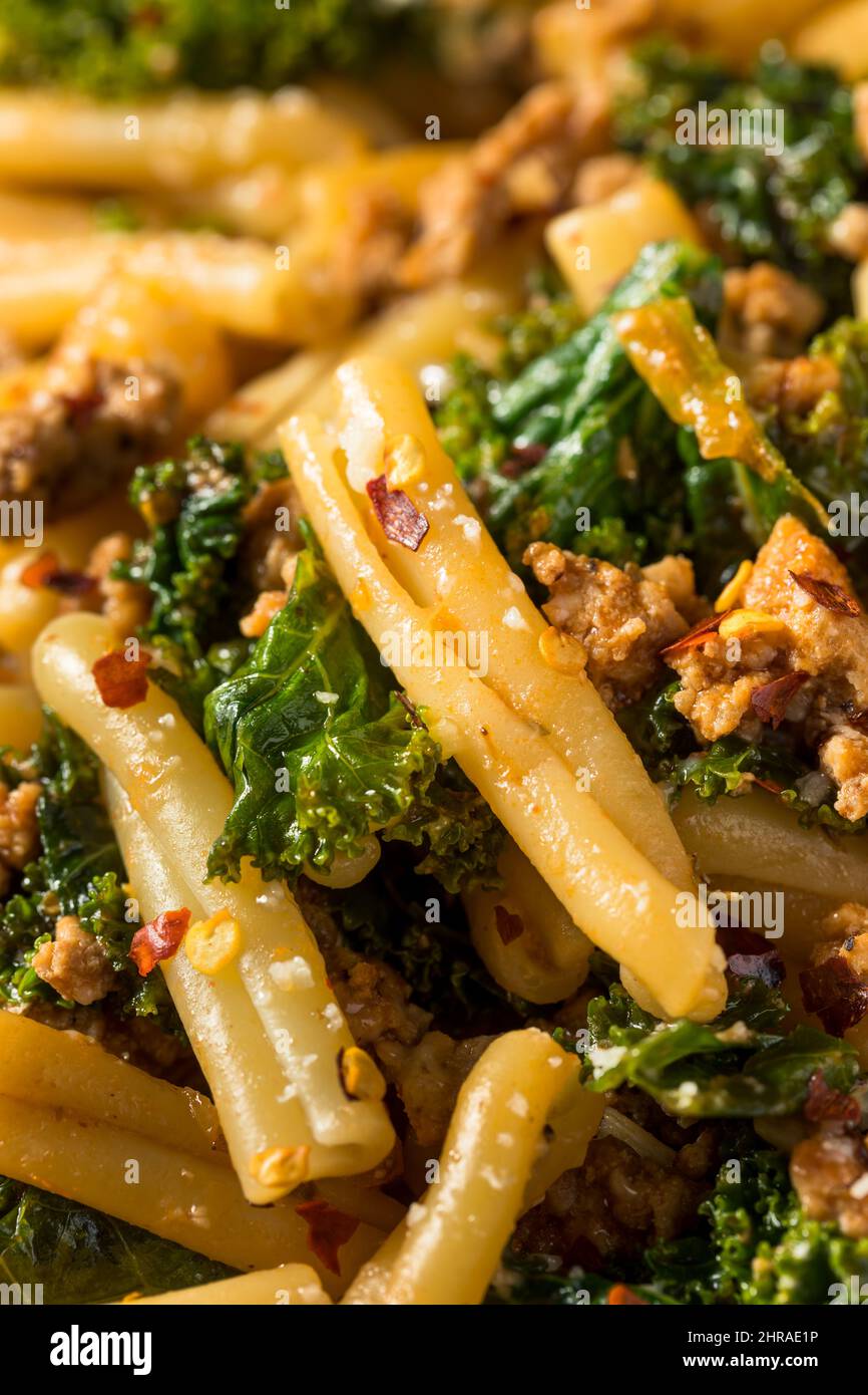 Homemade Kale and Sausage Caserecci Pasta with Cheese Stock Photo